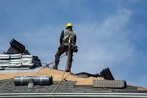 Professional Roofing technician working in Geneva, IA